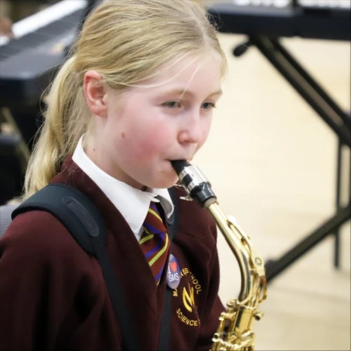 Tildy Award playing saxophone