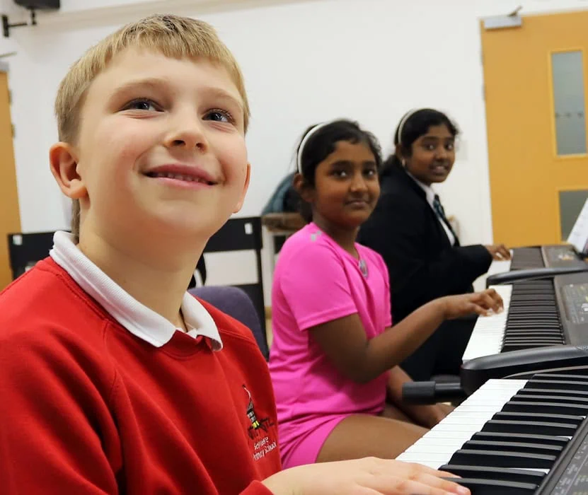 kids playing piano